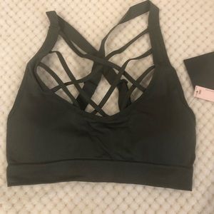 Victoria’s Secret sports bra in olive green. Size small